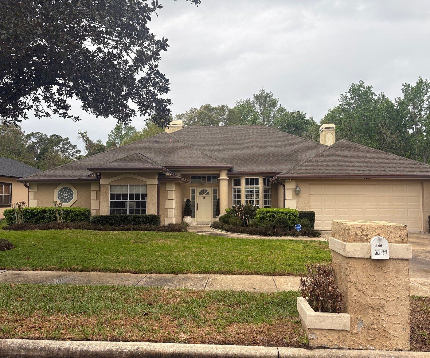 Exterior before repaint — Oviedo home