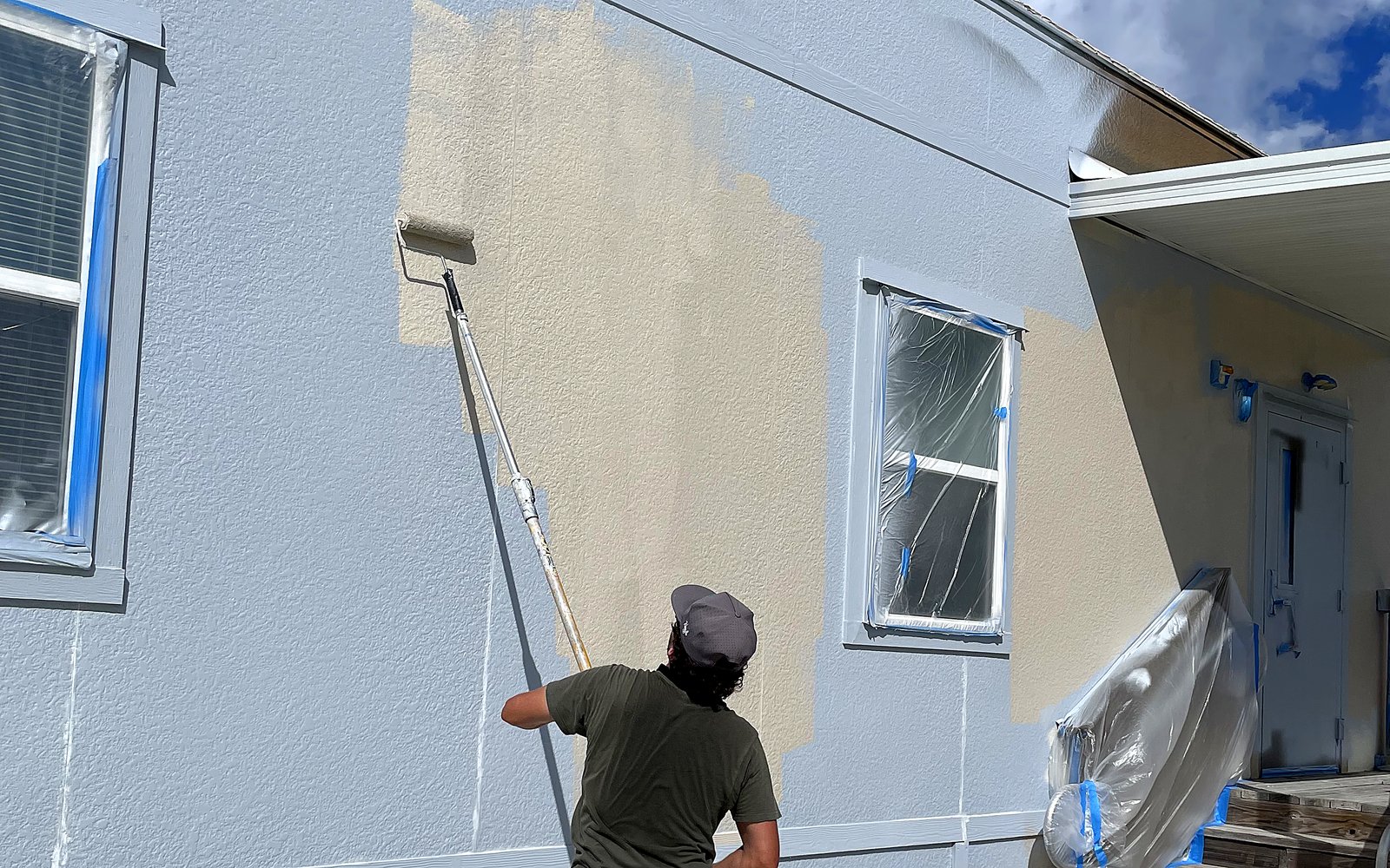 Commercial exterior painting at MCO Airport property, Orlando